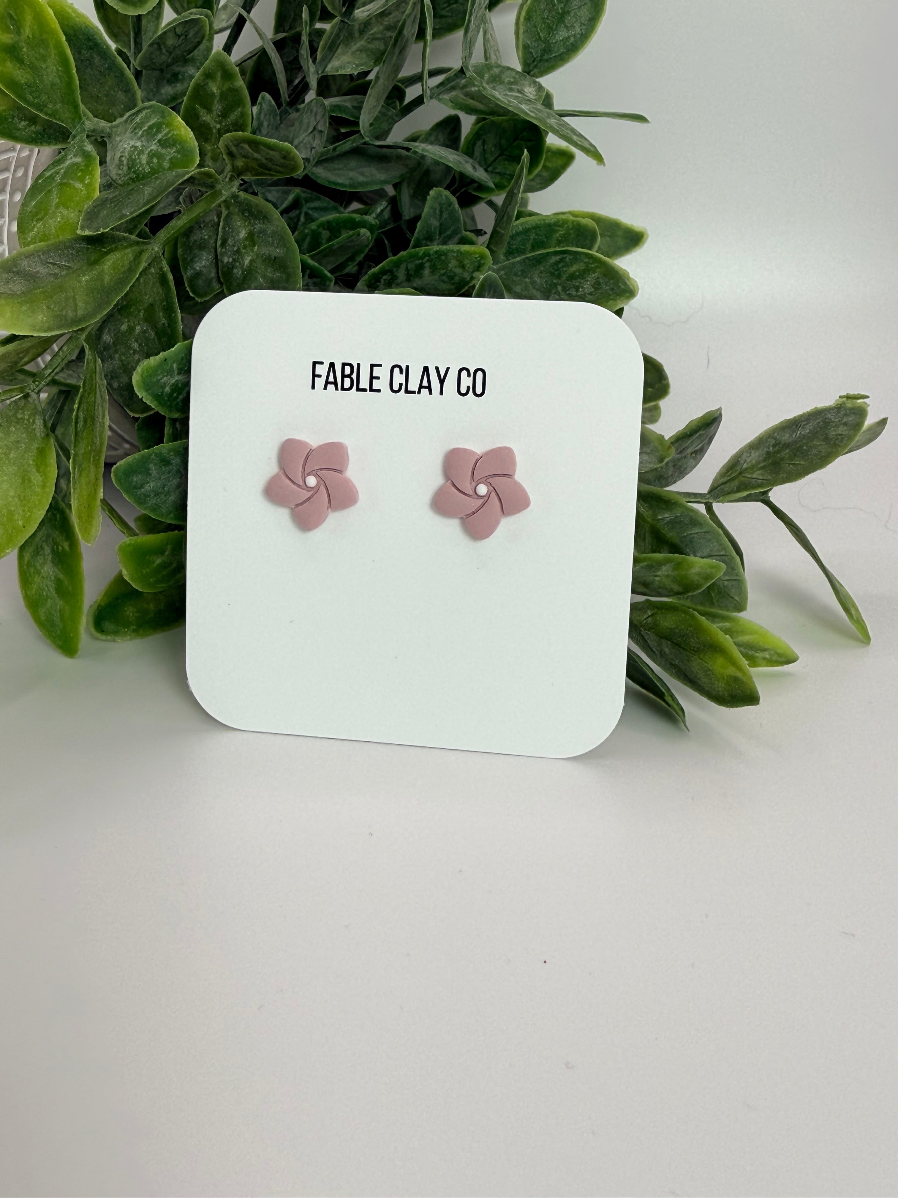 Fable Clay Co Fleur No. 1 ceramic vase with a textured white finish and rounded shape, on a neutral background.