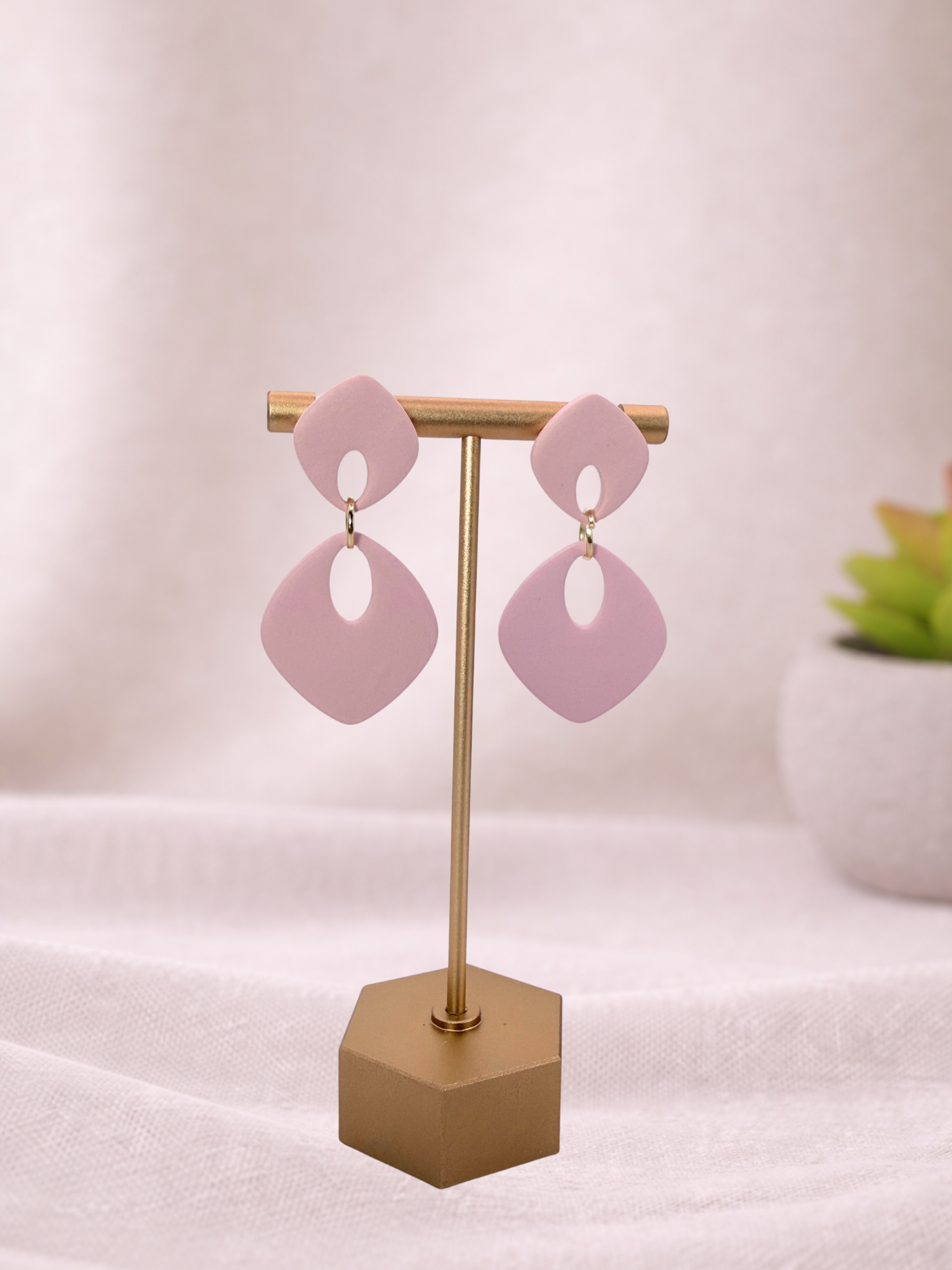 Fable Clay Co ISLA soft drop statement earrings with colorful clay design hanging from earlobes