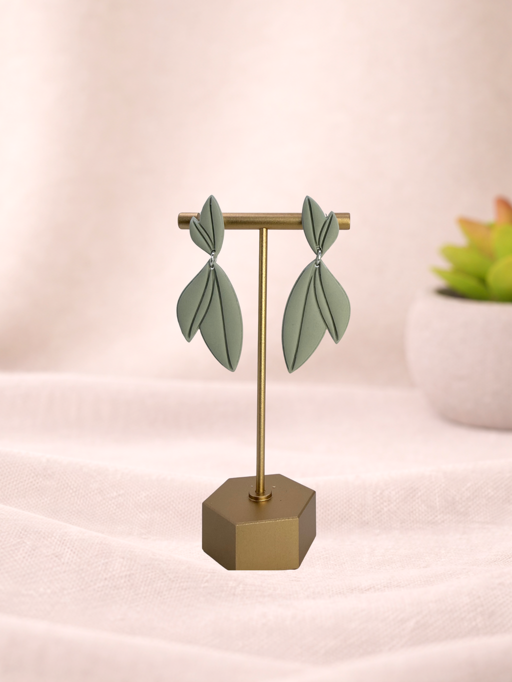 Fable Clay Co Liora Spring Vault ceramic vase with a smooth, rounded shape and pastel green glaze.