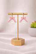 Fable Clay Co Fancy Sculpted Bow Wreath earrings, gold dangle studs with feminine statement design and lightweight clay material.