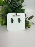 Pair of Fable Clay Co. pea-shaped ceramic planters with a smooth, matte finish for small plants or succulents.