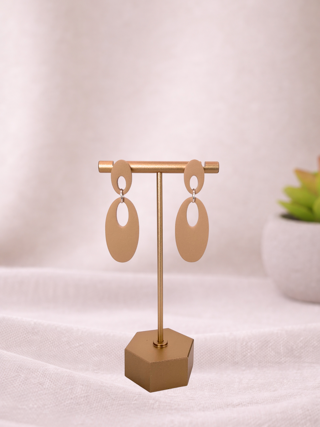 Fable Clay Co Reese minimal oval drop earrings in clay with sleek, modern design and smooth oval shape on a white background.