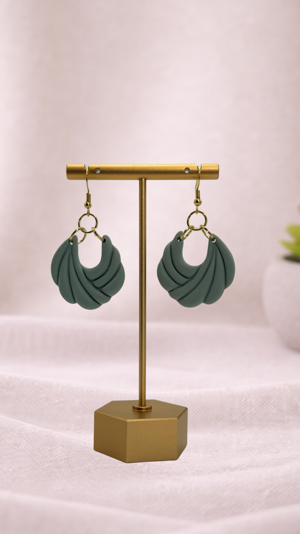 Fable Clay Co Arlow Spring Vault ceramic vase with textured surface and pastel green finish, showcasing a modern, handcrafted design.