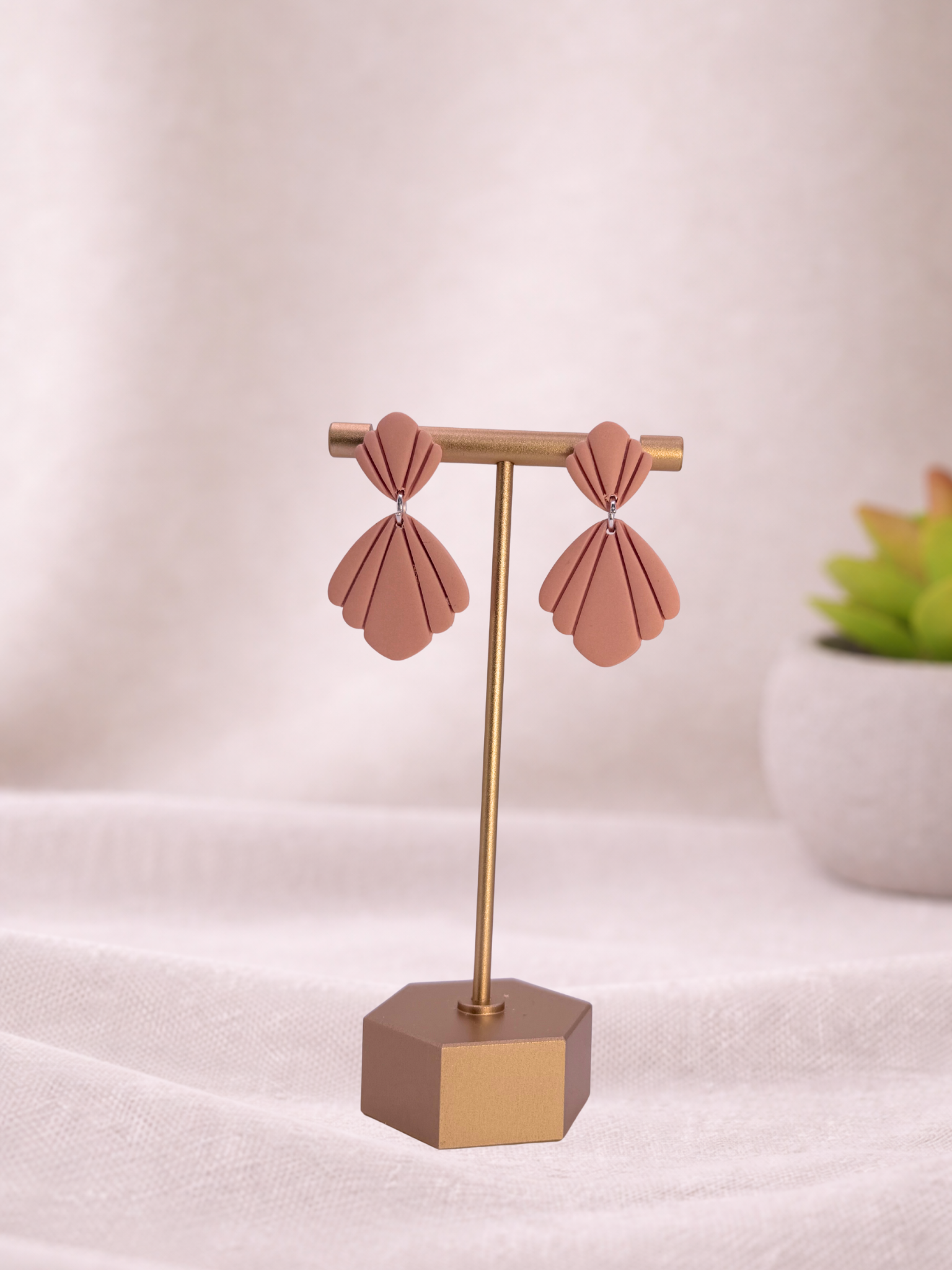 Fable Clay Co Belle Spring Vault ceramic vase with a smooth, rounded shape and pastel green glaze, showcasing elegant craftsmanship.