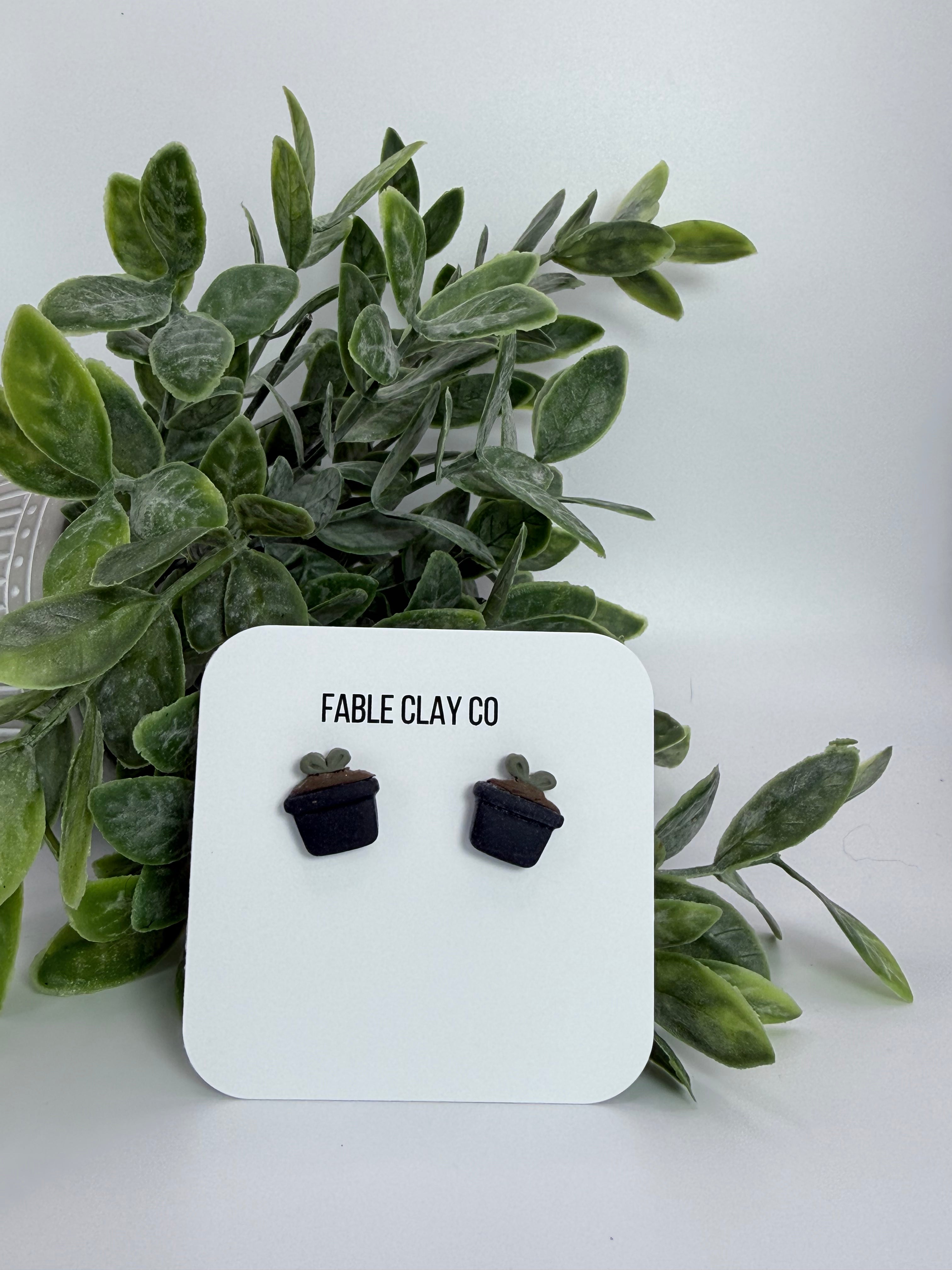 Fable Clay Co Sprout ceramic figurine with delicate green leaves and textured clay surface, showcasing artisanal craftsmanship.